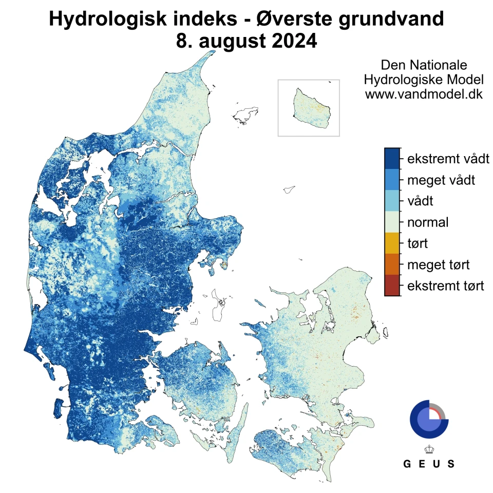 Et kort over Danmark viser det hydrologiske indeks for det øverste grundvand. Kortet har farver der varierer fra lys grøn til mærkeblå. En signaturforklaring viser, at det er i spændet 'normal' til 'ekstremt vådt'. Der er mest mørkeblå i syd- og østjylland.