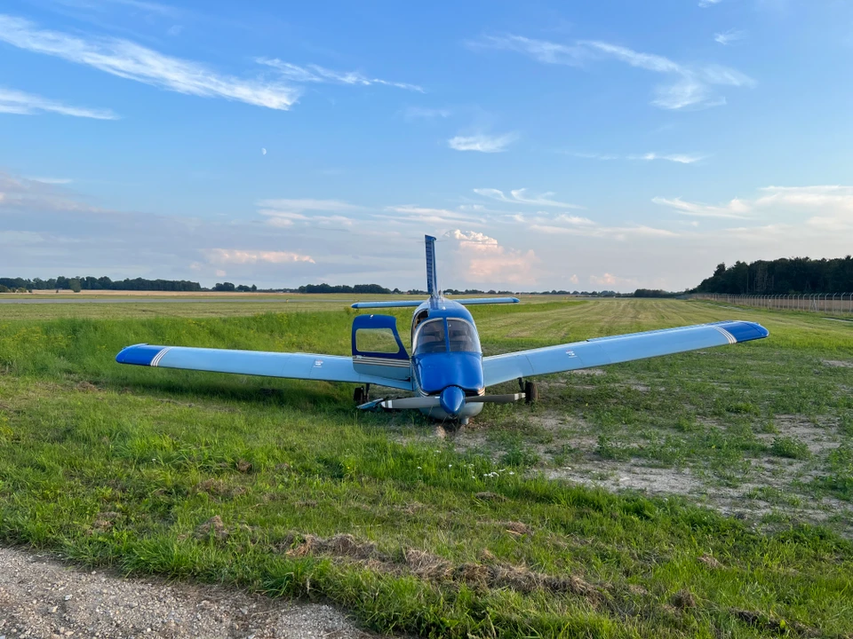 The aircraft on the accident site upon the runway excursion.