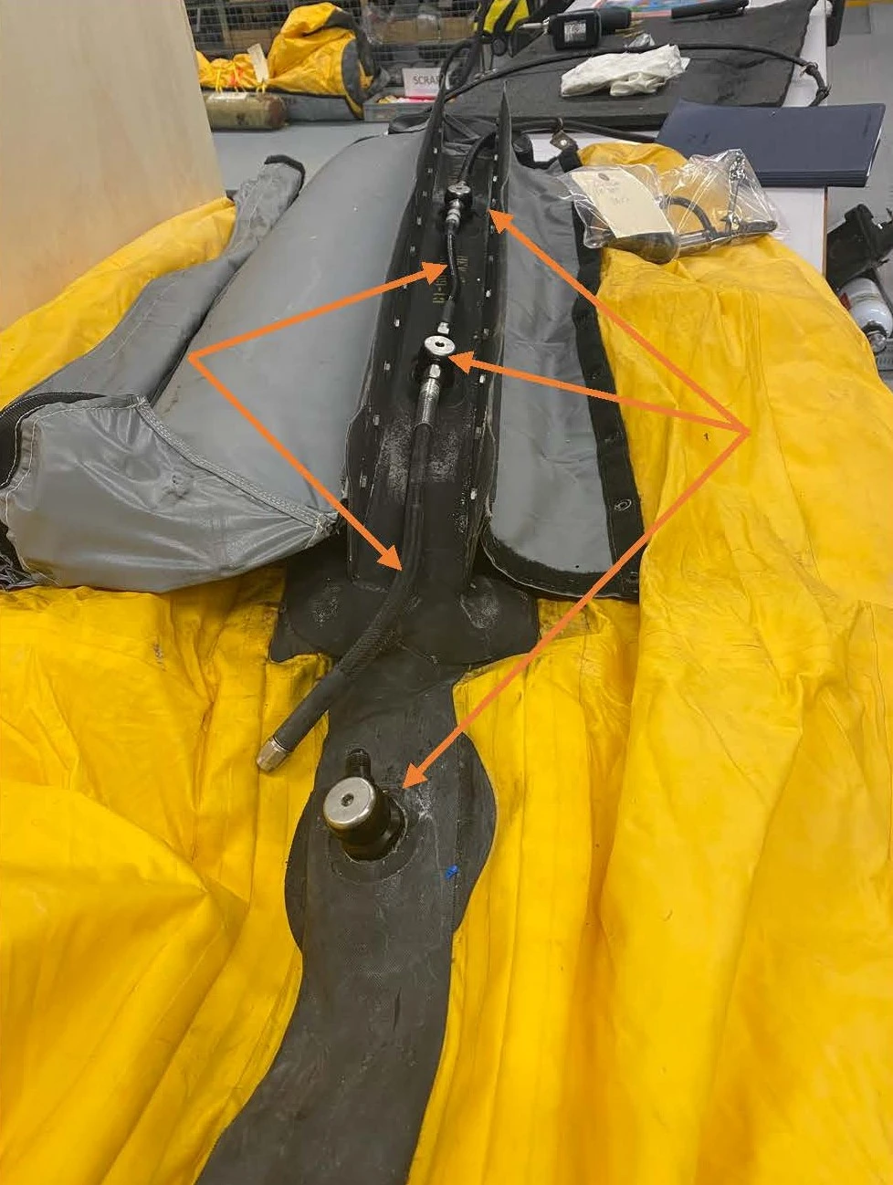 Aft float with inlet valves and interconnect hoses. Fwd and mid floats only had two inlet valves